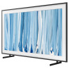 SAMSUNG The Frame Pro 55" (55LS03HW) TV MiniLED Lifestyle, vue trois quarts sur pieds avec cadre noir