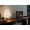 SAMSUNG Music Studio 7 LS70H enceinte connectée noire en ambiance salon avec lampe et livres