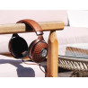 FOCAL STELLIA Reconditionné casque hi-fi suspendu à un fauteuil en bois en extérieur