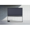 LG OLED77T4 TV OLED 77 pouces, vue de face écran abaissé sur pied avec boîtier Zero Connect